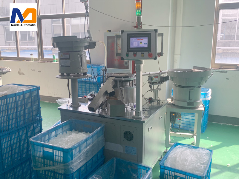 64883744e8e6e.jpg Piston assembly machine.jpg